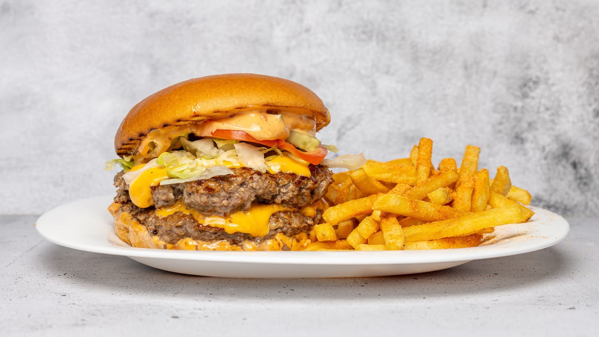 Double Cheeseburger meal with French fries at Gadegrillen in Vejle
