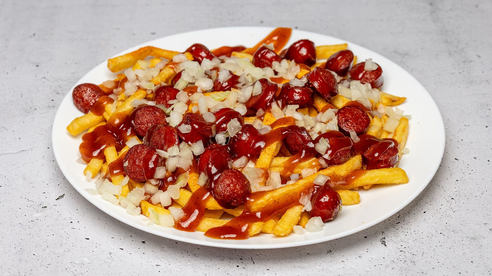 Danish sausage mix with French fries and onions at Gadegrillen in Vejle