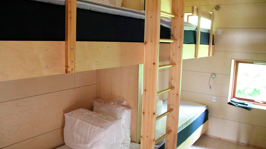 Sleep in a bedroom at Kyst- og Fjordcentret