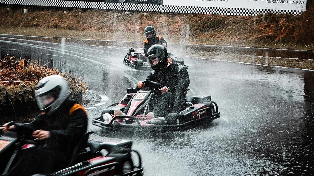 Go-kart race on wet track at Auning Kart Park