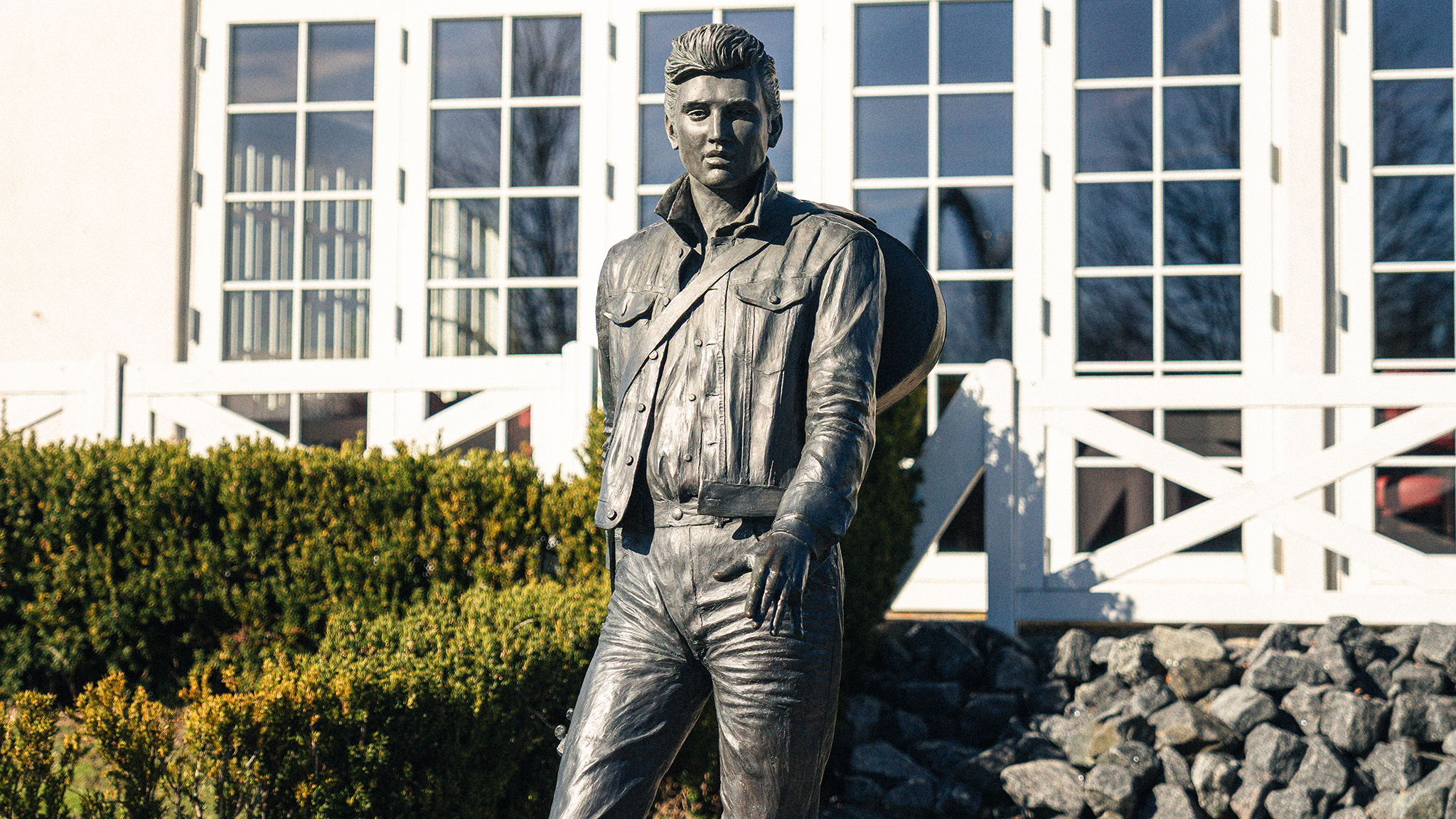 Statue of Elvis Presley in front of the Memphis Mansion museum in Randers