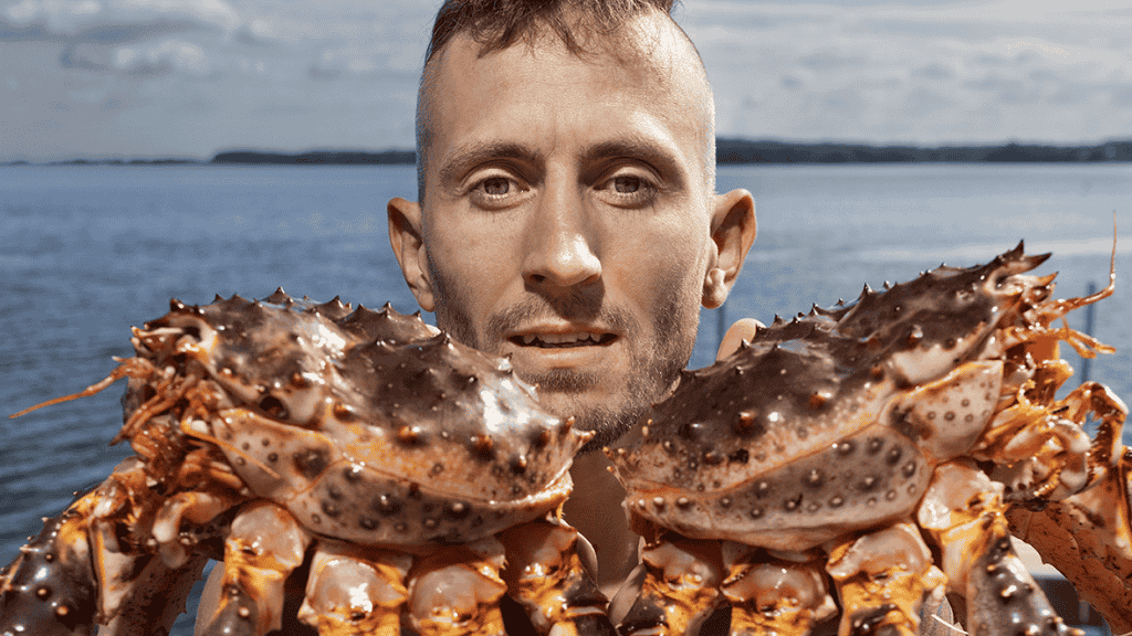 Paul Proffitt holds a big red crab