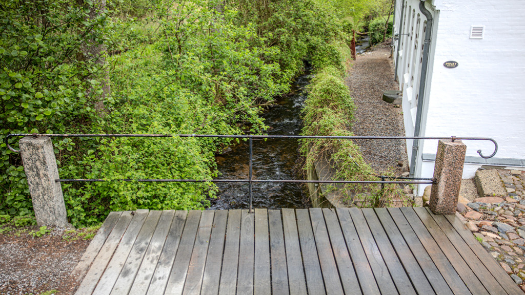 Wasser unter Brücke bei Rundemølle