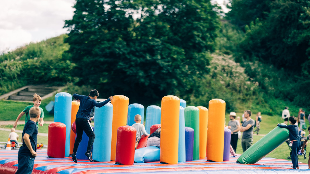 Kids on a Bouncy cushion at Stella Polaris