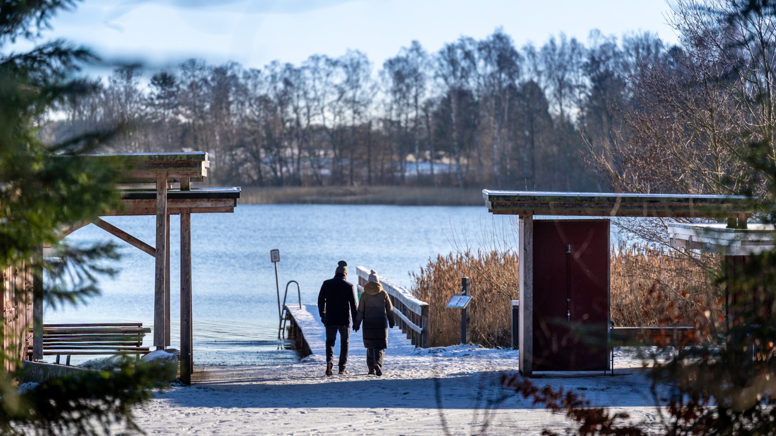 A couple walking in the winter landscape
